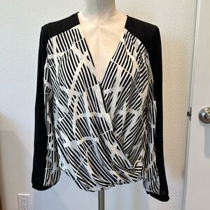 ASTR wrap blouse . Medium. Black and white
